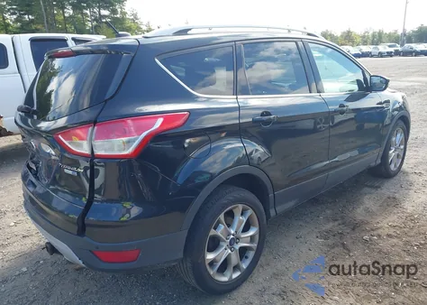 2015 Ford Escape Titanium z USA, uszkodzony, nr VIN 1FMCU9JXXFUA71933